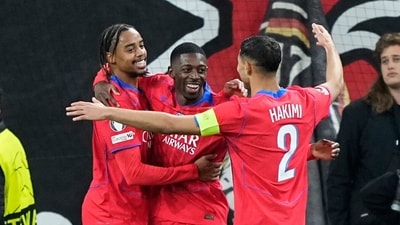 PSG's Ousmane Dembele celebrates with his teammates after scoring his side's sixth goal during a Champions League match (AP)