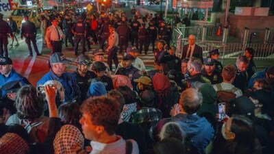Protesters face off with police during a protest against immigration crackdown in the aftermath of a raid on Tuesday, Oct. 21, 2025, in New York. (AP)