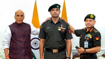 Union Defence Minister Rajnath Singh and Chief of the Army Staff (COAS) General Upendra Dwivedi confer the insignia of honorary rank of Lieutenant Colonel upon Olympic gold medallist javelin thrower Neeraj Chopra. (PIB) Union Defence Minister Rajnath Singh and Chief of the Army Staff (COAS) General Upendra Dwivedi confer the insignia of honorary rank of Lieutenant Colonel upon Olympic gold medallist javelin thrower Neeraj Chopra. (PIB)