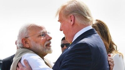 Prime Minister Narendra Modi greets US President Donald Trump upon his arrival in Ahmedabad. (PTI file)