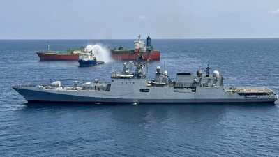 Indian Navy's warship INS Trikand during rescue operations after a fire broke out on Cameroon-flagged LPG carrier MT Falcon on Saturday, which was sailing southeast of the port of Aden, Yemen. (X/@indiannavy) Indian Navy's warship INS Trikand during rescue operations after a fire broke out on Cameroon-flagged LPG carrier MT Falcon on Saturday, which was sailing southeast of the port of Aden, Yemen. (X/@indiannavy)