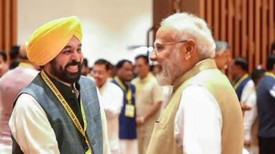 Prime Minister Narendra Modi with Punjab CM Bhagwant Mann at the meeting of the 10th governing council of the Niti Aayog in New Delhi in May. (PTI file photo) Prime Minister Narendra Modi with Punjab CM Bhagwant Mann at the meeting of the 10th governing council of the Niti Aayog in New Delhi in May. (PTI file photo)