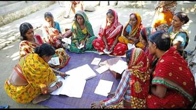 SHG women going over accounts of their FPO in Prayagraj (HT ) SHG women going over accounts of their FPO in Prayagraj (HT )