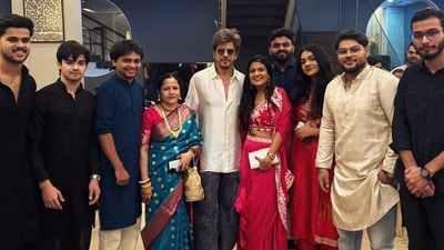 Shah Rukh Khan took time out to celebrate Diwali with Gauri Khan's team. Shah Rukh Khan took time out to celebrate Diwali with Gauri Khan's team.