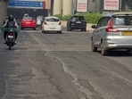 Commuters claim the patch merging into the underpass has undergone significant surface wearing. (HT photo)