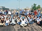 Contractual workers of Punjab Roadways, Punbus and PRTC block the Sherpur Chowk in Ludhiana on Thursday. (Gurpreet Singh/HT)