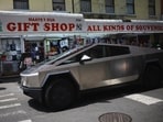A Tesla Cybertruck drives in Chinatown, in New York City, US, July 5, 2025. 