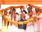 BJP national president JP Nadda being garlanded during an election rally in support of NDA candidates for the Bihar assembly elections at Patepur in Vaishali district on Thursday. (HT Photo)