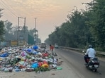 Residents say Gurugram’s sanitation system has “collapsed” as garbage and cracker debris lie unattended for days; MCG cites staff shortage post-festival. (Parveen Kumar/HT)