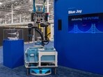 Amazon's latest robotic system Blue Jay is displayed during Amazon's "Delivering the Future" presentation at DUR3 Delivery Station in Milpitas, California on October 22, 2025. Amazon's latest robotic system Blue Jay is displayed during Amazon's "Delivering the Future" presentation at DUR3 Delivery Station in Milpitas, California on October 22, 2025.