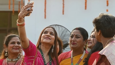 Some women with Delhi CM Rekha Gupta during a recent event at her residence. (Ishant Chauhan/HT File Photo)