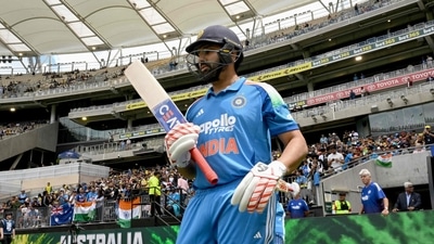 Rohit Sharma walks onto the field to open the innings for India. (AFP) Rohit Sharma walks onto the field to open the innings for India. (AFP)