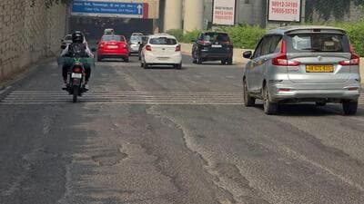 Commuters claim the patch merging into the underpass has undergone significant surface wearing. (HT photo) Commuters claim the patch merging into the underpass has undergone significant surface wearing. (HT photo)