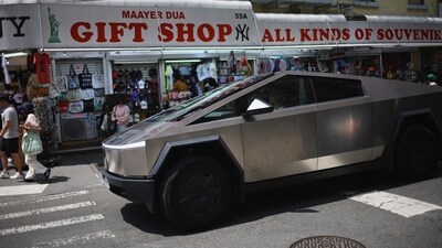 A Tesla Cybertruck drives in Chinatown, in New York City, US, July 5, 2025. (Reuters)
