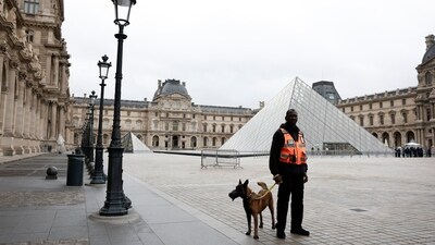 Two men wearing bright yellow jackets broke into the gallery at 9:34 am and left the room at 9:38 am, before fleeing the scene on the motorbikes. (REUTERS)