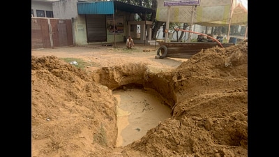 Family of Vijay Kumar alleged he was coerced into entering a deep pit at a private site. Locals took half an hour to pull him out; FIR filed. (HT Photo) Family of Vijay Kumar alleged he was coerced into entering a deep pit at a private site. Locals took half an hour to pull him out; FIR filed. (HT Photo)