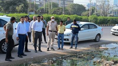 Municipal Commissioner Pradeep Dahiya inspects the sanitation system secondary garbage collection point at SPR road near DHBVN sub station, in Gurugram on Thursday. (Parveen Kumar/HT photo) Municipal Commissioner Pradeep Dahiya inspects the sanitation system secondary garbage collection point at SPR road near DHBVN sub station, in Gurugram on Thursday. (Parveen Kumar/HT photo)