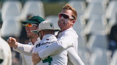 South Africa's Simon Harmer, right, celebrates with teammates after taking the wicket of Pakistan's Noman Ali (AP) South Africa's Simon Harmer, right, celebrates with teammates after taking the wicket of Pakistan's Noman Ali (AP)