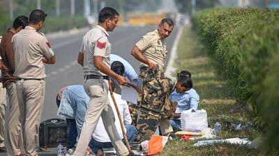 Police and forensics officials at the site of the encounter on Thursday. (Sanchit Khanna/HT Photo) Police and forensics officials at the site of the encounter on Thursday. (Sanchit Khanna/HT Photo)
