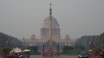 Rashtrapati Bhavan appears shrouded in a thick haze amid low visibility caused by deteriorating air quality in Delhi. (PTI) Rashtrapati Bhavan appears shrouded in a thick haze amid low visibility caused by deteriorating air quality in Delhi. (PTI)