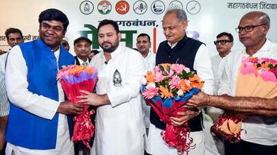 Vikassheel Insaan Party Chief Mukesh Sahni with Tejashwi Yadav, and former Rajasthan CM Ashok Gehlot in Patna on Thursday. (ANI) Vikassheel Insaan Party Chief Mukesh Sahni with Tejashwi Yadav, and former Rajasthan CM Ashok Gehlot in Patna on Thursday. (ANI)