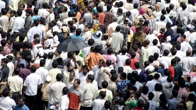 The crushing mass of humanity (Shutterstock)