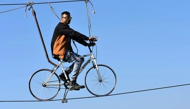 Sky cycling in India offers a breathtaking pedal-amongst-the-clouds experience, where adventure meets stunning aerial views. (unsplash) Sky cycling in India offers a breathtaking pedal-amongst-the-clouds experience, where adventure meets stunning aerial views. (unsplash)