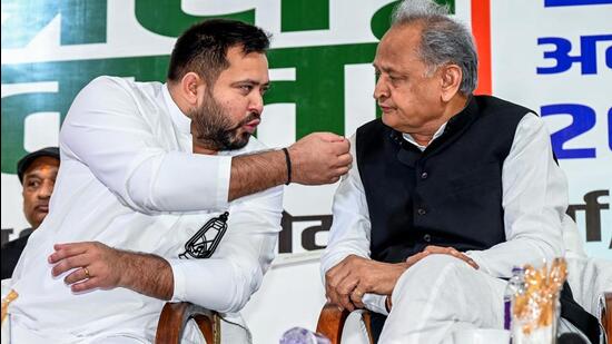 Bihar leader of opposition Tejashwi Yadav (left) with senior Congress leader Ashok Gehlot in Patna on Thursday. (ANI)