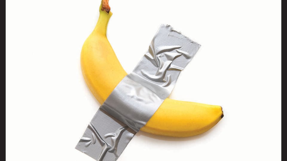 With Maurizio Cattelan’s banana taped to a wall, the ridiculousness is the point . (SHUTTERSTOCK)