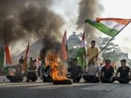 A tyre set on fire during a statewide bandh in Agartala on Thursday. (PTI) A tyre set on fire during a statewide bandh in Agartala on Thursday. (PTI)