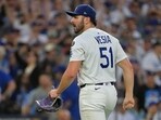 Los Angeles Dodgers pitcher Alex Vesia (51) reacts after a strike out in the eleventh inning against the Philadelphia Phillies 