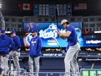 Shohei Ohtani of the Los Angeles Dodgers works out on the field during World Series Workout Day ahead of Game 1 of the World Series at Rogers Centre.