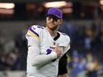 Carson Wentz #11 of the Minnesota Vikings walks off the field as he holds his arm after being defeated by the Los Angeles Chargers Carson Wentz #11 of the Minnesota Vikings walks off the field as he holds his arm after being defeated by the Los Angeles Chargers