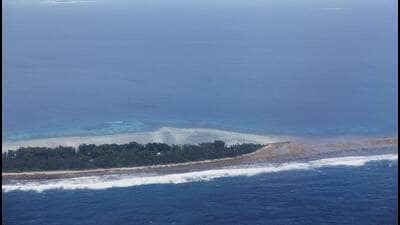 An aerial view of the Pacific Islands nation of Tuvalu. Rising sea levels caused by climate change have prompted the Tuvalu government to strike a climate migration pact with Australia. (REUTERS)