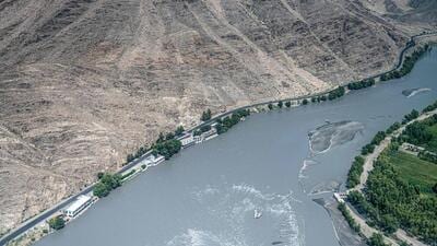 An aerial view shows the Kunar river running past a hillside in Kunar province on September 14 (AFP) An aerial view shows the Kunar river running past a hillside in Kunar province on September 14 (AFP)