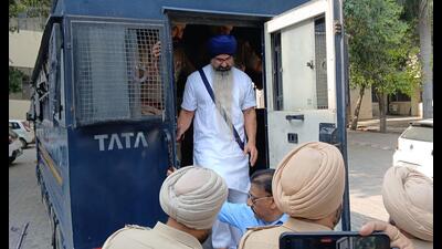 Death-row convict Balwant Singh Rajoana heading to the Government Dental College, Patiala on Friday. (HT Photo)