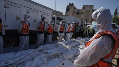 The bodies of unidentified Palestinians, returned from Israel as part of a ceasefire deal, are prepared for a mass funeral, outside Nasser Hospital in Khan Younis, Gaza Strip, Wednesday, Oct. 22, 2025. (AP) The bodies of unidentified Palestinians, returned from Israel as part of a ceasefire deal, are prepared for a mass funeral, outside Nasser Hospital in Khan Younis, Gaza Strip, Wednesday, Oct. 22, 2025. (AP)
