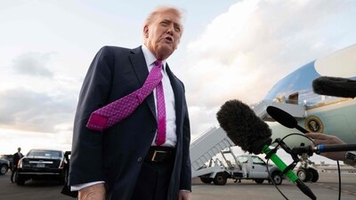US President Donald Trump speaks to the press after disembarking from Air Force One upon arrival at Palm Beach International Airport in West Palm Beach, Florida, October 17, 2025. (AFP)