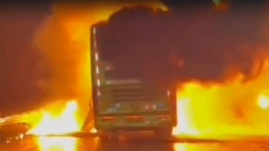 Bus seen burning in Andhra Pradesh's Kurnool district near Chinnatekur village that claimed the lives of 20 passengers on Friday morning.(HT Photo/Sourced )