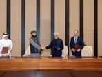 File photo of Afghan Defence Minister, Mullah Mohammad Yaqoob Mujahid and Pakistan's Defence Minister, Khawaja Muhammad Asif shake hands, following the signing of a ceasefire agreement, during a negotiations meeting mediated by Qatar and Turkey, in Doha, Qatar, October 19, 2025. 