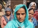 Sandeep Lathar’s wife, Santosh Devi, interacting with media in Julana on Friday. (HT) Sandeep Lathar’s wife, Santosh Devi, interacting with media in Julana on Friday. (HT)