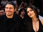Justin Herbert and Madison Beer have made rare public appearance courtside at the LA Lakers game.