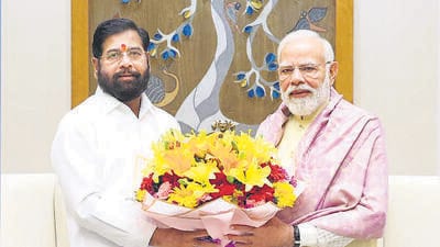 **EDS: RPT CORRECTS DETAILS, THIRD PARTY IMAGE** In this image posted on Oct. 25, 2025, Prime Minister Narendra Modi with Maharashtra Deputy Chief Minister Eknath Shinde during a meeting, in New Delhi. (@mieknathshinde/X via PTI Photo)(PTI10_25_2025_RPT130B) (@mieknathshinde) **EDS: RPT CORRECTS DETAILS, THIRD PARTY IMAGE** In this image posted on Oct. 25, 2025, Prime Minister Narendra Modi with Maharashtra Deputy Chief Minister Eknath Shinde during a meeting, in New Delhi. (@mieknathshinde/X via PTI Photo)(PTI10_25_2025_RPT130B) (@mieknathshinde)