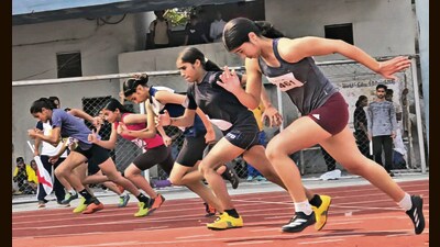Athletes in action at the 69th Inter-District School Tournament at Guru Nanak Stadium in Ludhiana on Saturday. (Manish/HT) Athletes in action at the 69th Inter-District School Tournament at Guru Nanak Stadium in Ludhiana on Saturday. (Manish/HT)