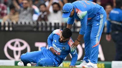 India's Shreyas Iyer (L) reacts in pain after falling on the ground while taking a catch to dismiss Australia's Alex Carey during the third one-day international (ODI) (AFP) India's Shreyas Iyer (L) reacts in pain after falling on the ground while taking a catch to dismiss Australia's Alex Carey during the third one-day international (ODI) (AFP)