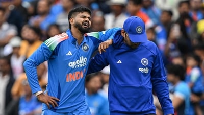 Shreyas Iyer reacts in pain after falling on the ground while taking a catch to dismiss Australia's Alex Carey- (AFP) Shreyas Iyer reacts in pain after falling on the ground while taking a catch to dismiss Australia's Alex Carey- (AFP)