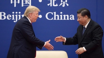 File photo of China's President Xi Jinping with US President Donald Trump. (AFP) File photo of China's President Xi Jinping with US President Donald Trump. (AFP)