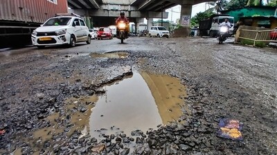 Local residents have blamed the civic authorities for negligence, stating that repeated complaints about the poor condition of the APMC Road have gone unheard. (Representational image) Local residents have blamed the civic authorities for negligence, stating that repeated complaints about the poor condition of the APMC Road have gone unheard. (Representational image)