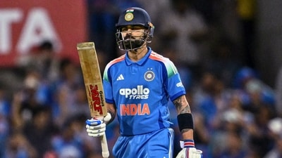 Virat Kohli celebrates his half-century during the third One-Day International. (PTI)