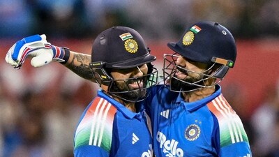 Rohit Sharma celebrates his century with teammate Virat Kohli during the third One-Day International. (PTI) Rohit Sharma celebrates his century with teammate Virat Kohli during the third One-Day International. (PTI)